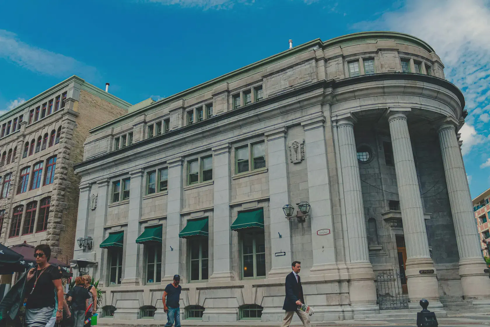 Neoclassical courthouse building with tall stone columns